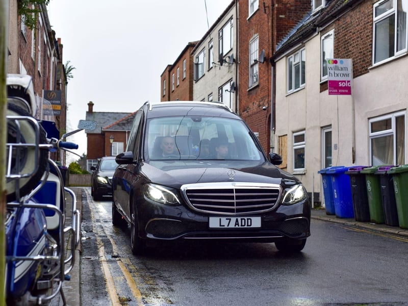 The funeral procession began in Witham Street