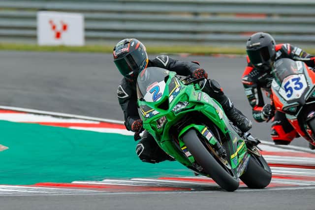 TJ Toms in race action at Donington