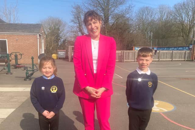 Victoria Atkins arrives at the school.