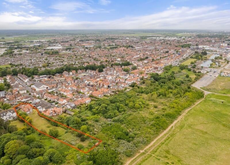 An aerial view showing the boundary of the property's grounds.