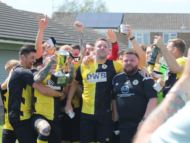 The Colts with their trophy.