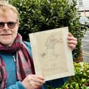 John Byford with the unique sketch of the Jolly Fisherman