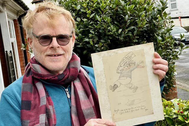 John Byford with the unique sketch of the Jolly Fisherman