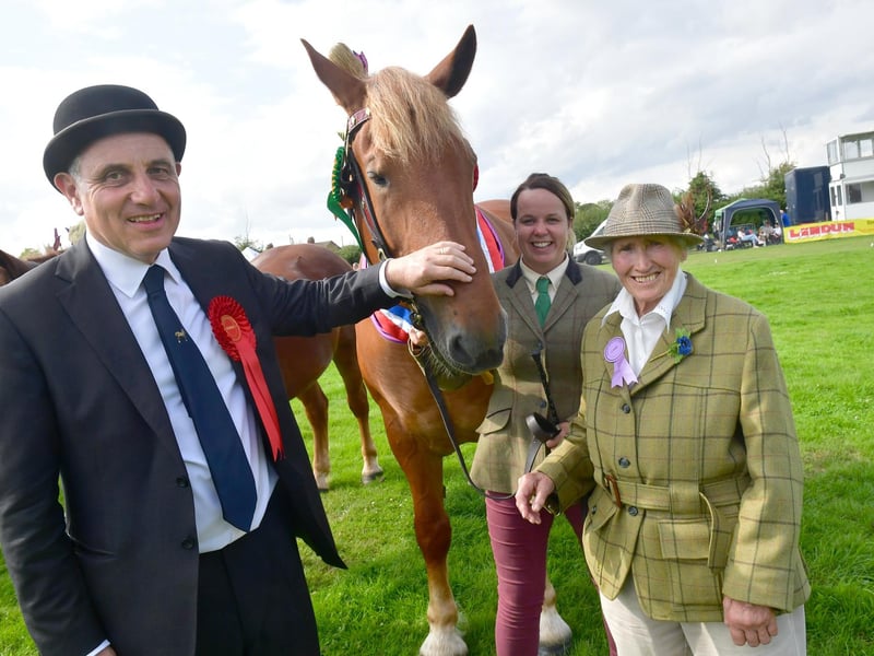 Heavy Horse Parade in the Main Ring. L-R show chairman Charles Pinchbeck and Rebecca Sumner with Scarlet, overall heavy horse champion