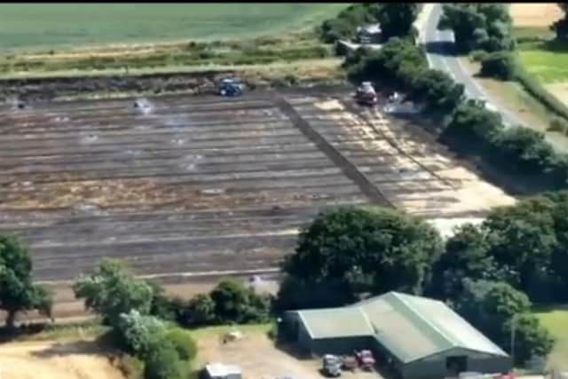 A drone shot of a field at Drayton Top destroyed by fire.