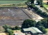 A drone shot of a field at Drayton Top destroyed by fire.