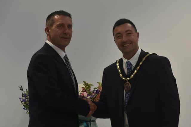 Coun Adrian Findley congratulates Coun Jimmy Brookes on becoming the new Mayor of Skegness.