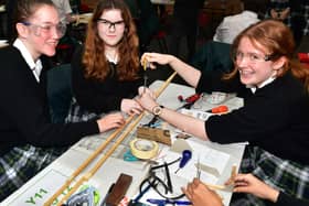 From left -  Emily,  Chira and Rosie of KSHS taking part in the STEM challenge. Photo: Mick Fox