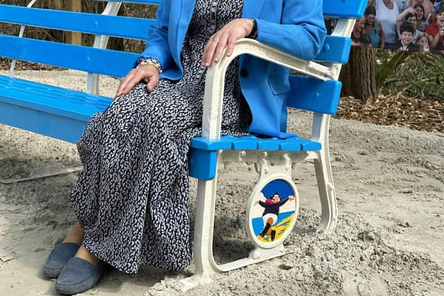 Ingrid Lohmann, Deputy Mayor, on the 'Jolly' bench  wearing her matching jacket.