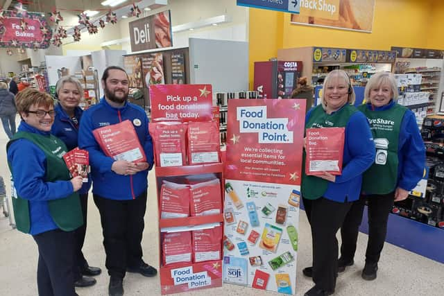 Tesco colleagues at the Fairshare stand. Image: Dianne Tuckett