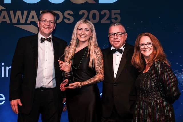 Joel Evans (left) and Yasmin Quinn (middle left) from Fowler Welch receive their Award