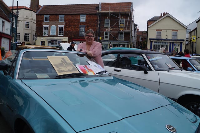 Christine Robinson with her husband's Triumph TR7 - one of the last of its type made.