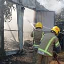 Firefighters at the scene of the workshop blaze at the Bubblecar Museum, Langrick. Picture: Paula Ashleigh-Morris