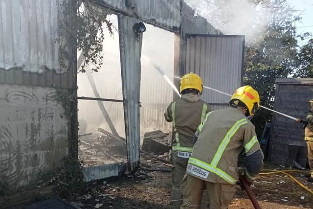 Firefighters at the scene of the workshop blaze at the Bubblecar Museum, Langrick. Picture: Paula Ashleigh-Morris