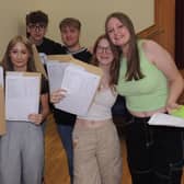 Celebrations on GCSE results day at St George's Academy. From left - Keira Woollaston, Libby Gallett, Will Draper, Alex Langford, Gracie Greensmith and Rhiannon Clarkson.