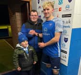Man of the match Mackenzie Burdass with Joshua and George Hallam