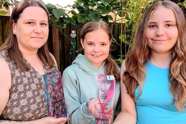 Catherine Howard (left) daughters Amelia (11) and Leah (14), of Mini Pamper Hampers with 2 awards.