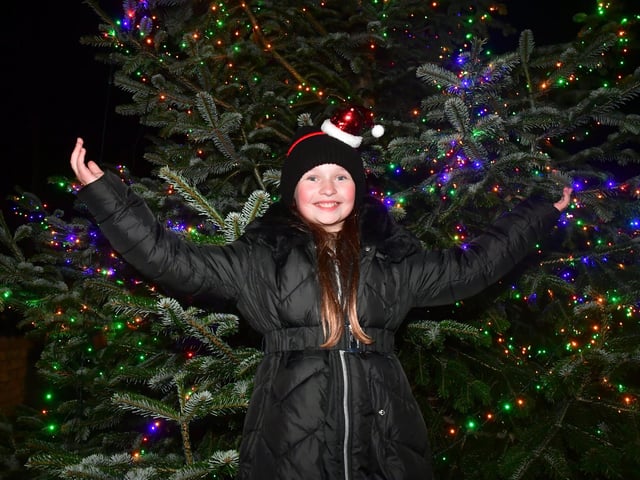 Ines Fournier-Vernon 10 of Navenby who switched on the Christmas tree lights. Photo: David Dawson