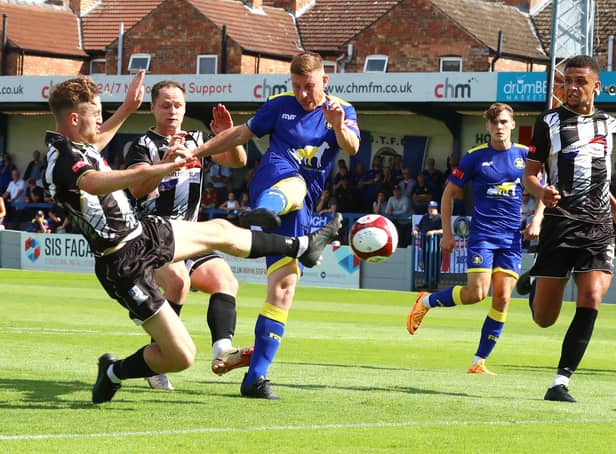 Gainsborough Trinity's Andrew Wright is tackled by Stafford Rangers' Joseph Dunne. Picture by Dan Westwell