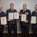 PCs Christopher Hine, David Sharpe and Jack Craft and Sergeant Simon Watson and with their awards.