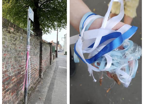 Ribbons left tied to a lamp post, left, and others ripped off and found left on the ground, right.