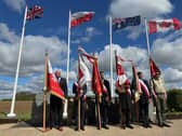 Flags flying at the official opening. Image: WLDC