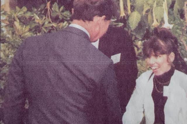 Dee Dee Lee (right) meeting Prince Charles after performing for him on his birthday.