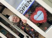 Ruth Burrows at her Art Shop and Studio in Navigation Yard, sporting one of the #LoveSleaford promotional posters.