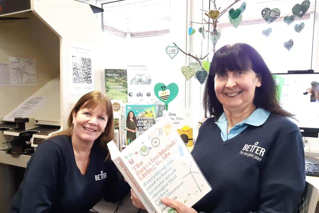 The library's Mel Fenwick and Pat Forester with one of the book displays