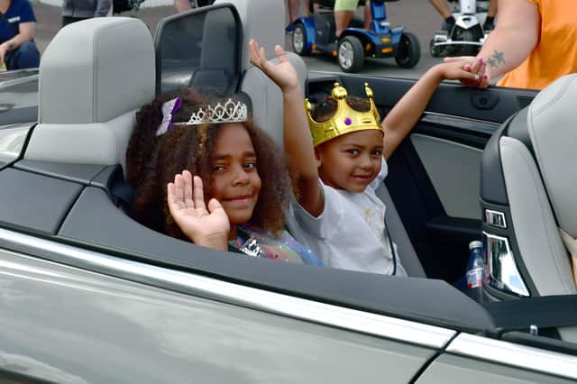 Carnival prince and princess Aaron Rose, 8, and Ella Duncan Cramp, 10, travelling in style.