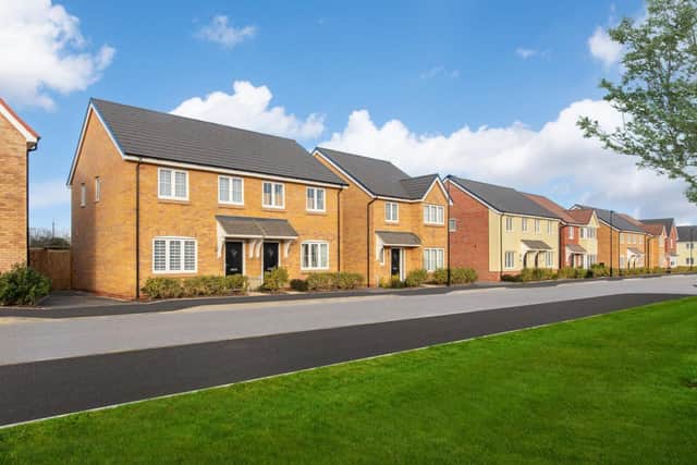 A street scene at Bellway’s Bourne Springs development, where buyers can get a deposit boost