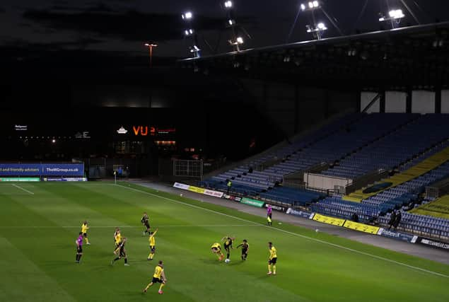 An empty stadium has become common sight. But how many fans will come back when the turnstyles re-open? (Photo by Catherine Ivill/Getty Images)