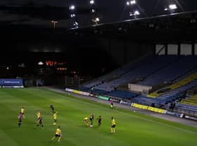 An empty stadium has become common sight. But how many fans will come back when the turnstyles re-open? (Photo by Catherine Ivill/Getty Images)