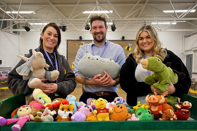 Teachers Miss Garrod, Mr Noden and Miss Brooks at the bric-a-brac sale.