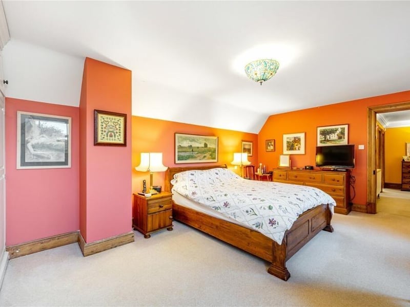 One of the five bedrooms.
