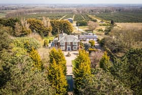 An aerial view of the property and its grounds.