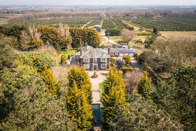 An aerial view of the property and its grounds.