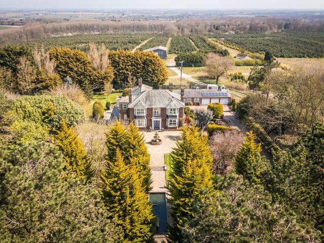 An aerial view of the property and its grounds.