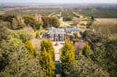 An aerial view of the property and its grounds.