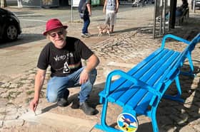 John Byford installung the bench in Bad Gandersheim.