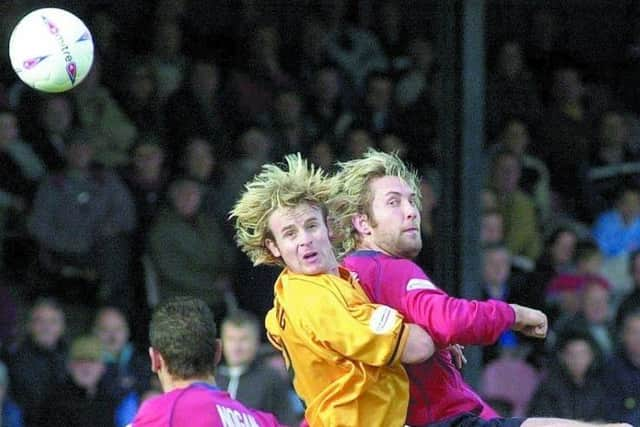 Matt Hocking clashes with Jon Parkin.