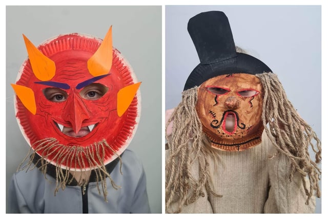 Two of the festival masks made by children in Boston.