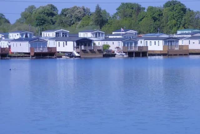 Some of the lodges at Seven Lakes sit right at the wayer's edge.