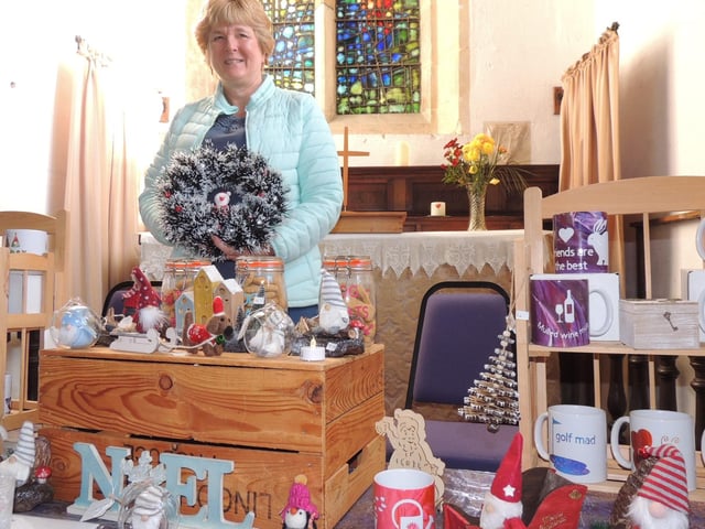 Karen Fuller with her stall choc-full of Christmas gift ideas at Crafts By Candlelight, Silk Willoughby.