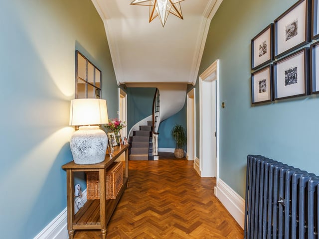 The circular staircase, one of three staircases in the house.