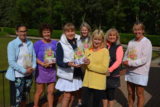 Captain Roz Wallis, centre right, presented the winners with their prizes