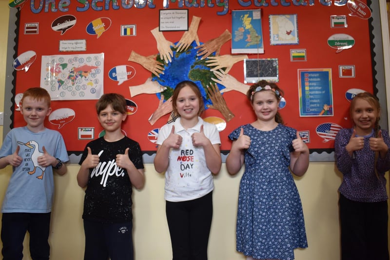 Thumbs-up for Comic Relief fundraising ... a quintet from Boston's Staniland Academy.