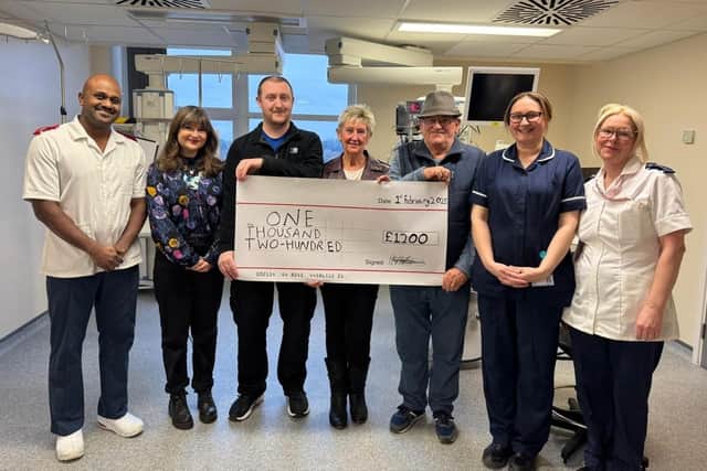 Lyn with family and friends making a donation to staff on the Intensive Care Unit, at Boston's Pilgrim Hospital. Separate donations would take the total past £1,500.