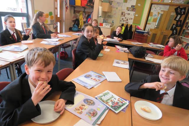 Church Lane School pupils tucking into bagels during their first breakfast club.
