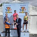 MP Richard Tice getting on with his  work 'representing the people of Boston and Skegness ' by handing out medals at the Boston Marathon.
